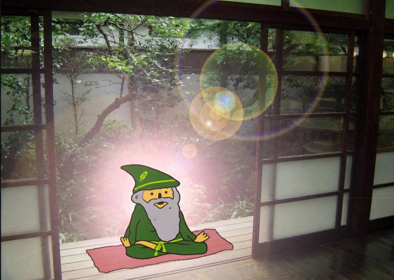 The wizard meditating on a deck by a Japanese garden